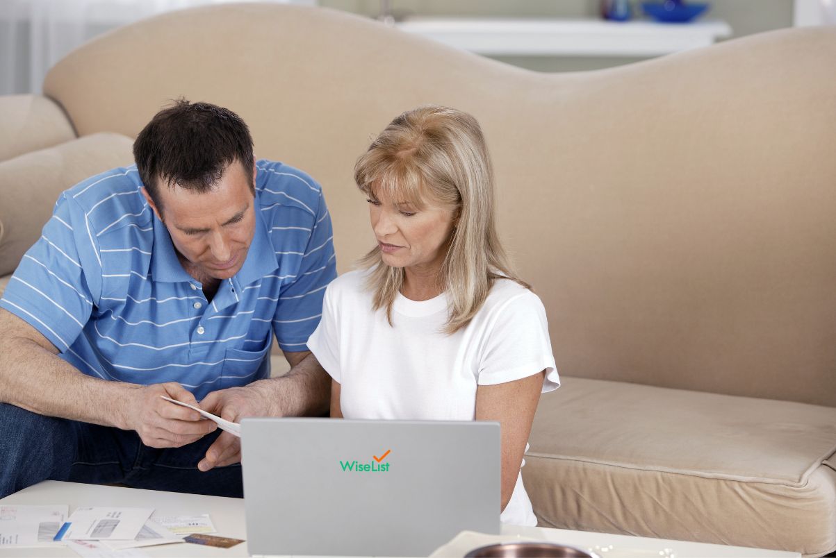 Senior-woman-with-calculator-and-bills-counting-1